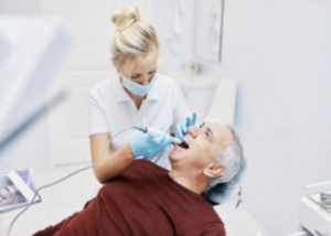 how does a dental implant work sydney